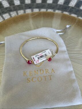 Kendra Scott Merida Gold Bangle with magenta Stone End Caps
